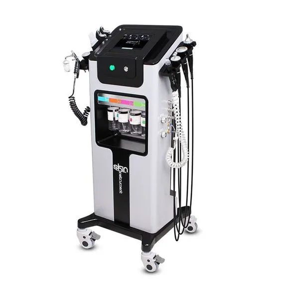 Sleek silver aesthetic machine with multiple attached tubes and devices, used for skincare treatments; it stands on wheels, conveying modernity and efficiency.